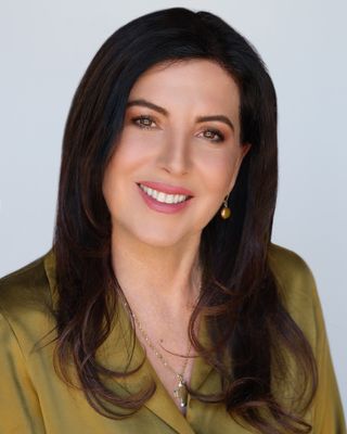 Portrait of Stephanie Poulos Arrasi, REALTOR®